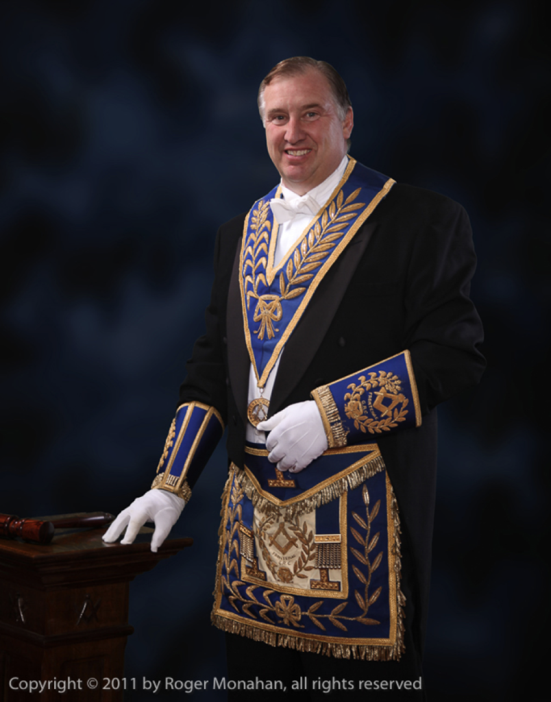 Portrait of a Masonic Grand Lodge officer (District Deputy Grand Master) showing Right Worshipful regalia.

Shot using Chroma Key and background substitution.